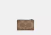 Coach Outlet Zip Card Case In Blocked Signature Canvas In Brown