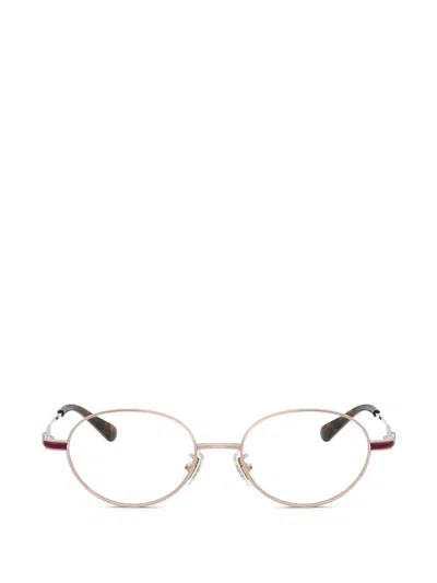 Coach Oval-frame Titanium Glasses In Gold
