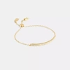 Coach In Gold