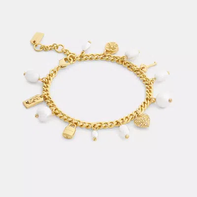 Coach Pearl And Heart Charm Bracelet In Gold