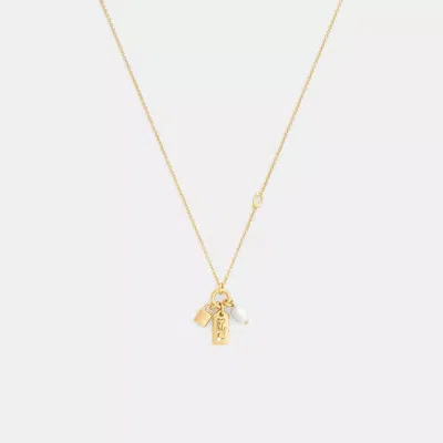 Coach Pearl Charm Pendant Necklace In Gold