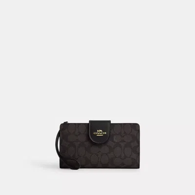 Coach Phone Wallet In Signature Canvas In Beige