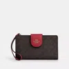 Coach Phone Wallet In Signature Canvas In Multi