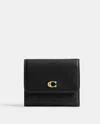 Coach Polished Pebble Leather Essential Small In Black
