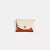 Coach Remade Colorblock Medium Signature Shearling Pouch In Beige Multi