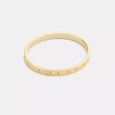 Coach Repeated C Hinged Bangle In Gold