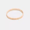 Coach Repeated C Hinged Bangle In Gold