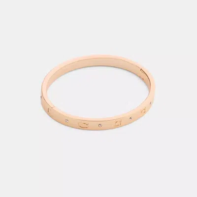 Coach Repeated C Hinged Bangle In Gold
