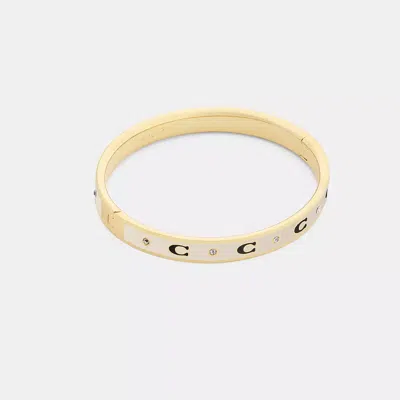 Coach Repeated C Hinged Bangle In Gold