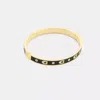 Coach Repeated C Hinged Bangle In Multi