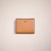 Coach Restored Bifold Snap Wallet In Brass/light Camel