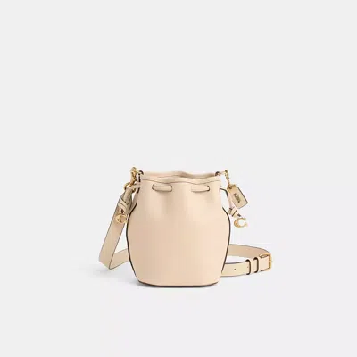 Coach Restored Camila Bucket Bag In Brass/ivory