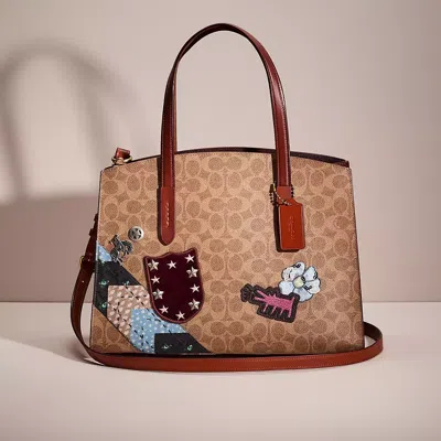 Coach Restored Charlie Carryall In Signature Patchwork In Brown