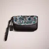 COACH RESTORED CLUTCH WITH LEATHER SEQUINS