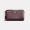 Coach Restored Continental Wallet In Gold/oxblood