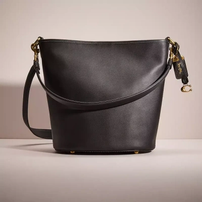 Coach Restored Dakota Bucket Bag In Brass/black