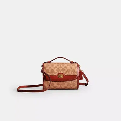 Coach Restored Kip Turnlock Crossbody In Signature Canvas In Brass/tan/rust