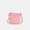 Coach Restored Kitt Messenger Crossbody In Brass/bubblegum