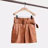 Coach Restored Leather Belted Shorts In Penny