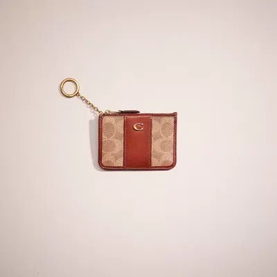 Coach Restored Mini Skinny Id Case In Signature Canvas In Brass/tan/rust