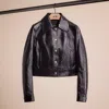 COACH RESTORED PATENT LEATHER JACKET