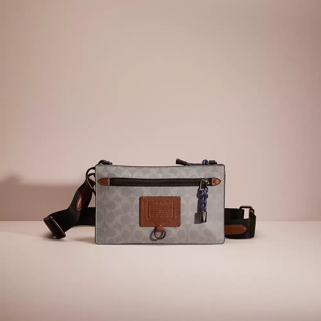Coach Restored Rivington Convertible Pouch In Reflective Signature Canvas In Silver saddle black ModeSens