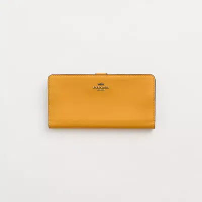 Coach Restored Skinny Wallet In Brass/buttercup