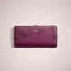 Coach Restored Skinny Wallet In Brass/deep Berry