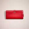 Coach Restored Skinny Wallet In Brass/sport Red