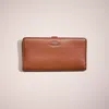 Coach Restored Skinny Wallet In Light Gold/saddle