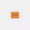 Coach Restored Slim Billfold Wallet In Orange