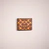 Coach Restored Slim Billfold Wallet In Signature Leather In Saddle/papaya