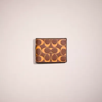 Coach Restored Slim Billfold Wallet In Signature Leather In Saddle/papaya