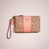 Coach Restored Small Wristlet In Colorblock Signature Canvas In Brass/tan Light Coral