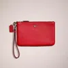 Coach Restored Small Wristlet In Silver/sport Red