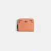 Coach Restored Small Zip Around Wallet With Prairie Rivets Detail
