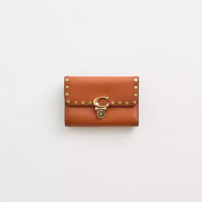 Coach Restored Studio Medium Wallet With Rivets In Brass/canyon
