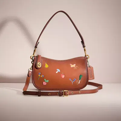 COACH RESTORED SWINGER BAG WITH GARDEN EMBROIDERY 