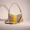 Coach Restored Swinger In Signature Jacquard In Brass/oak Flax