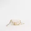 Coach Restored Tabby Crossbody Wristlet With Pillow Quilting In Brass/chalk