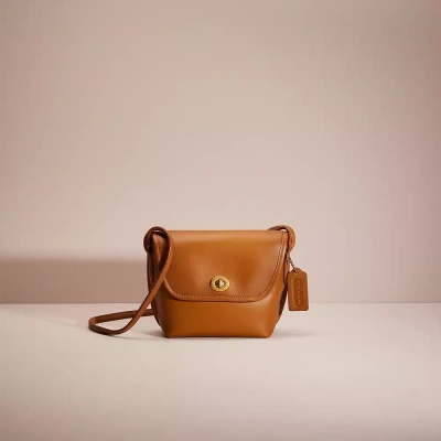 Coach Restored Turnlock Pouch In Brass/light Saddle