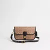 Coach Restored Turnlock Tab Messenger Bag In Signature Canvas In Brass/tan/black