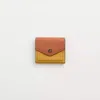 Coach Restored Wyn Small Wallet In Colorblock In Pewter/flax