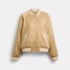 Coach Reversible Signature Souvenir Varsity Jacket In Sand