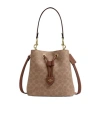 Coach Rowan Bucket Bag In Signature Canvas In Neutral