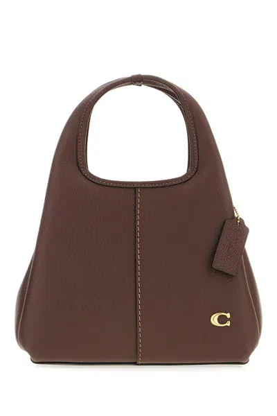 Coach Shoulder Bags. In Brown