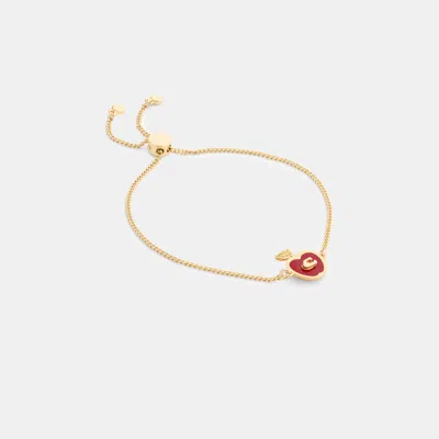 Coach Signature Apple Slider Bracelet In Gold