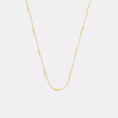 Coach Signature Bar Chain Necklace In Yellow