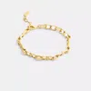 Coach Signature Chain Link Bracelet In Yellow