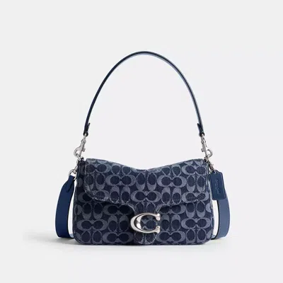 Coach In Blue
